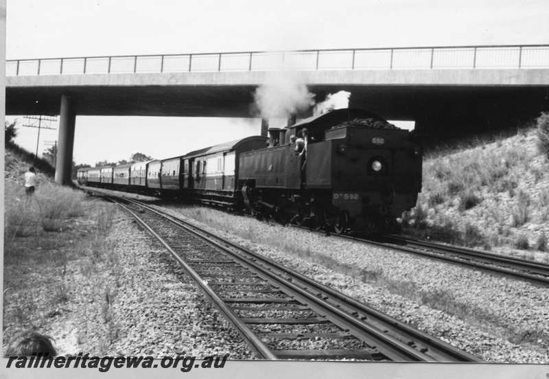 P03509
DD class 592 steam locomotive running bunker first, on ARHS Twilighter Tour, side and end view, Forrestfield.
