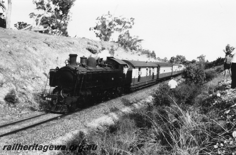 P03510
DD class 592 steam locomotive, on ARHS Twilighter Tour, front and side view, going through a cutting near Wellard.
