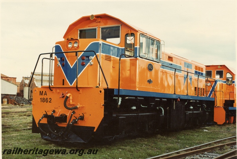 P03555
MA class 1862 diesel locomotive, front and side view, in orange livery, c1970s.
