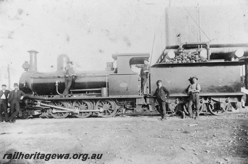 P03573
G class 2-6-0- steam loco, side view, Water column, water tower, EGR line, driver Fredrik Nelson, c1894
