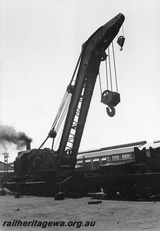 P03583
7 of 7 images of the Cowans Sheldon 60 ton breakdown crane No.31, in steam, jib raised, side and front view
