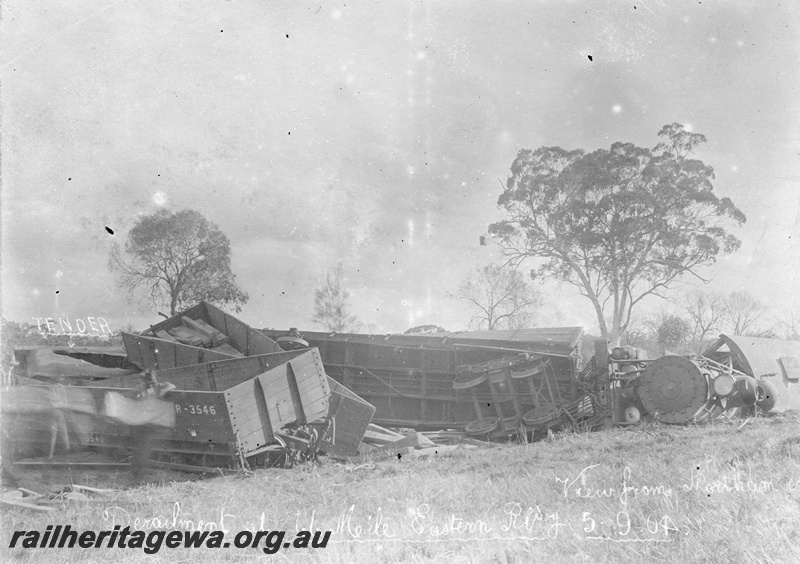 P03707
Derailment of loco and carriages, 66 mile, view from Northam, ER line
