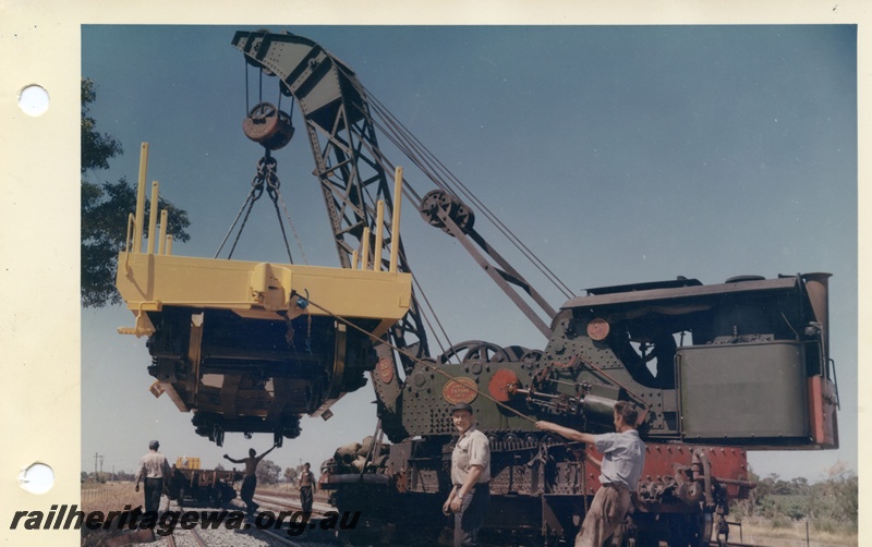 P03722
Cravens 25 ton breakdown crane No 23, lifting WSP flat top wagon, view from rear of crane and wagon
