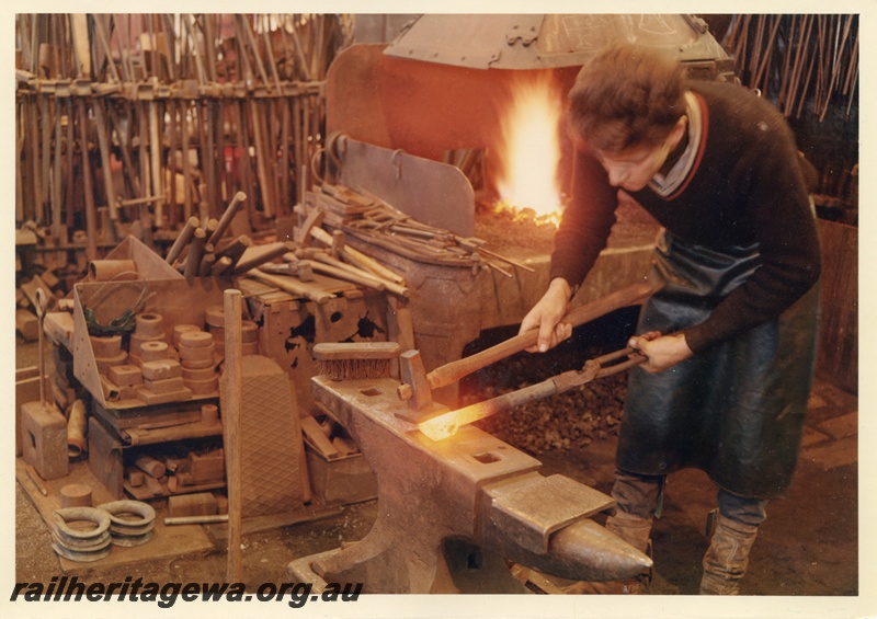 P03731
Apprentice boilermaker, working at Midland Workshops
