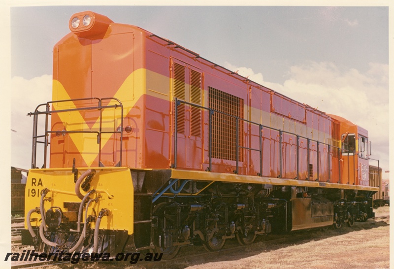 P03758
RA class 1910 diesel locomotive, front and side view, in international orange livery, as new.
