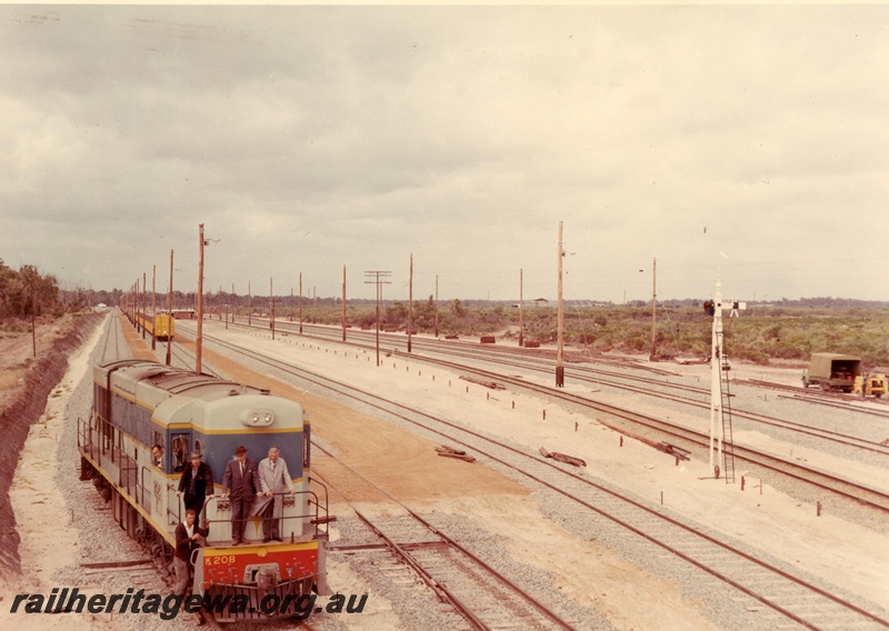 P03798
K class 208, light and dark blue with yellow lining, Kwinana yard, signal
