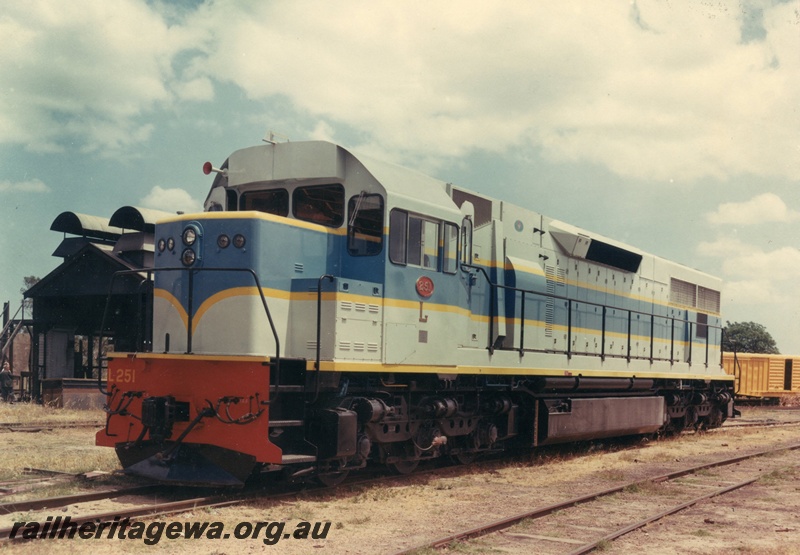 P03805
2 of 2 views of L class 251, light and dark blue with yellow lining, front and side view
