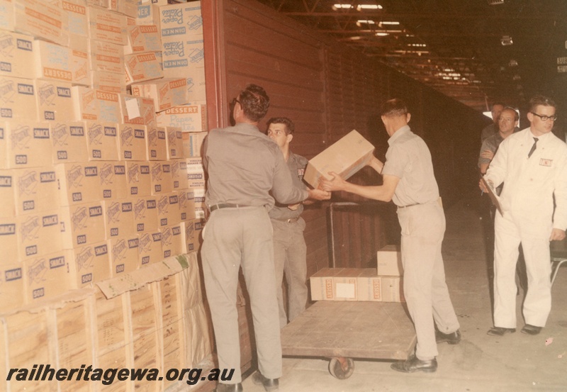P03813
Freight loading by hand, first interstate van, TNT terminal, Kewdale
