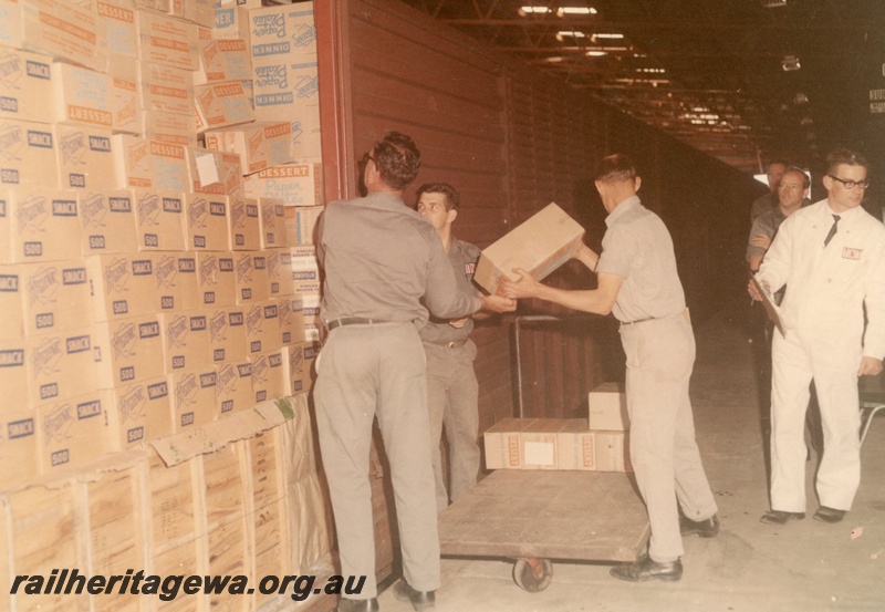 P03813
Freight loading by hand, first interstate van, TNT terminal, Kewdale
