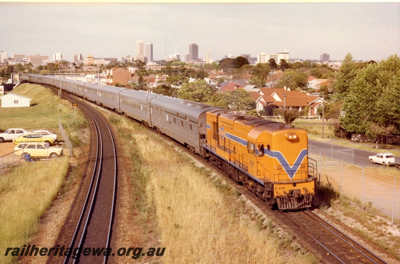 P03818
K class 204, Westrail orange with blue and white stripe, heading 