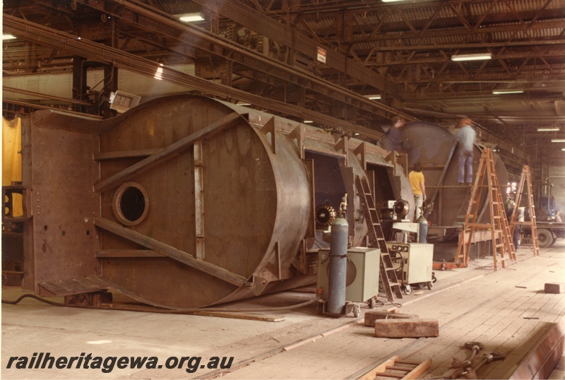 P03833
7 of 7 images of XE class wagons, under construction, Midland Workshops, one wagon on side, one wagon upright
