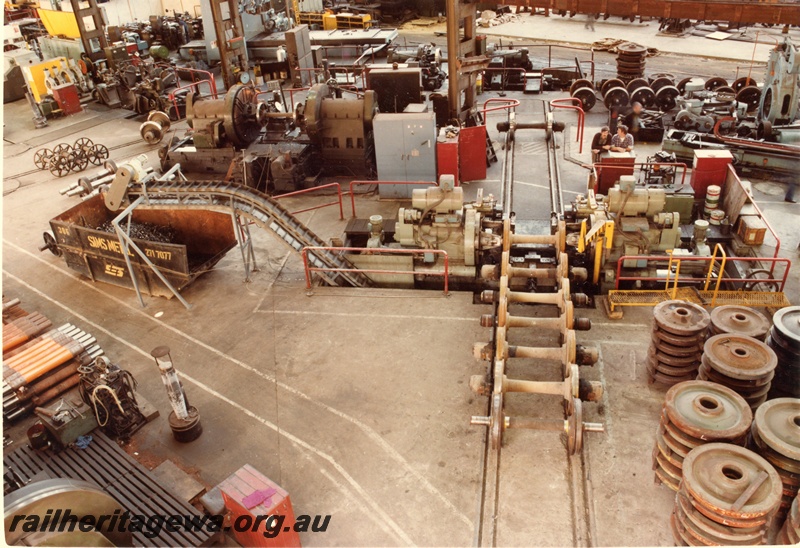 P03851
Wheel shop, Block 3, Midland Workshops, overhead view wheel assembly shop showing wheel lathe.
