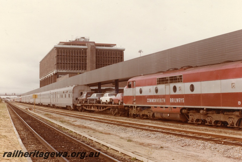 P03897
Commonwealth Railways (CR) GM class 19 diesel locomotive on the Indian Pacific motor rail train, side view.
