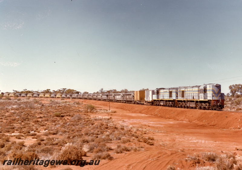 P03912
KA class 212. Nickel train blue with yellow chevron, full length view. location Unknown
