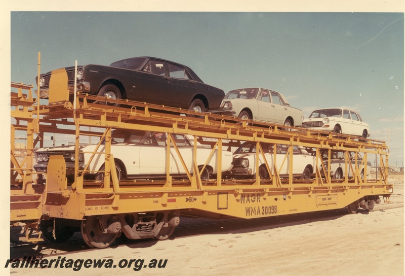 P03956
WMA class 30098 standard gauge motor vehicle wagon, two deck, loaded, side view.
