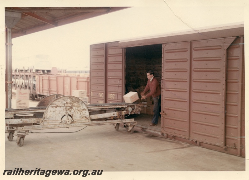 P03968
Commonwealth Railways (CR) VC class 1137 covered goods van being loaded.
