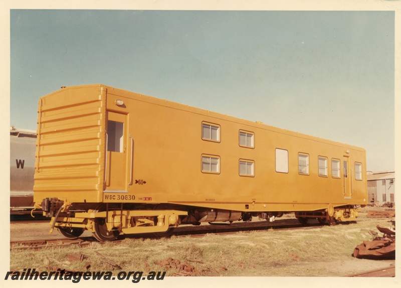 P03969
WSC class 30630 standard gauge break down flat wagon, in as new condition, yellow livery, end and side view.
