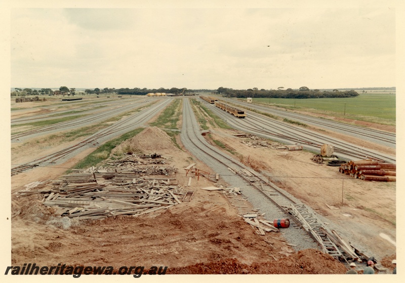 P03983
1 of 3, Elevated view of West Merredin yard, wagons of rails in the background, standard gauge construction project.
