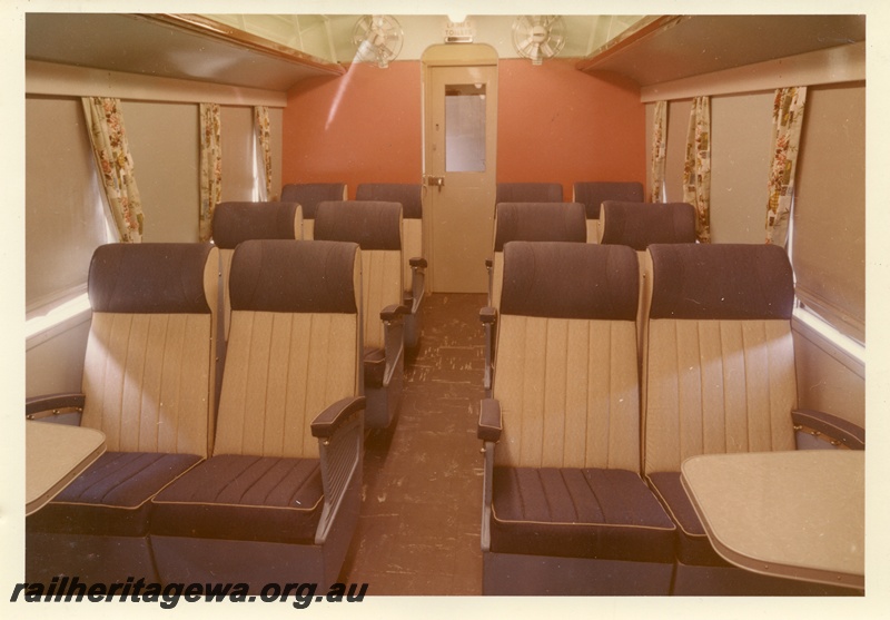 P04008
AYS class carriage, interior view, brown colour scheme, fans, tables, window treatments
