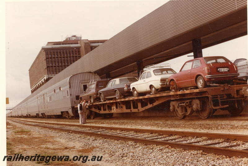 P04021
Motor rail carriage, other stainless steel carriages, terminal building, East Perth terminal, side and end view
