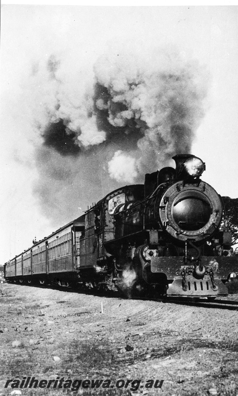 P04075
P class steam locomotive, on the Kalgoorlie Express heading eastwards to Kalgoorlie, Yellowdine, EGR line. View along the train. Photo printed back to front
