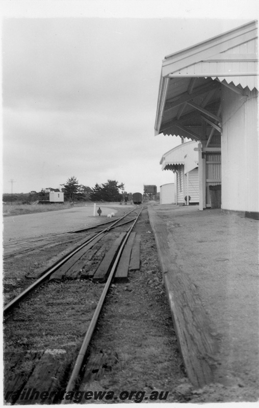 P04332
4 of 8, Station buildings, view down side of buildings and platform towards water towers, points, cheese knobs, Elleker, GSR line.
