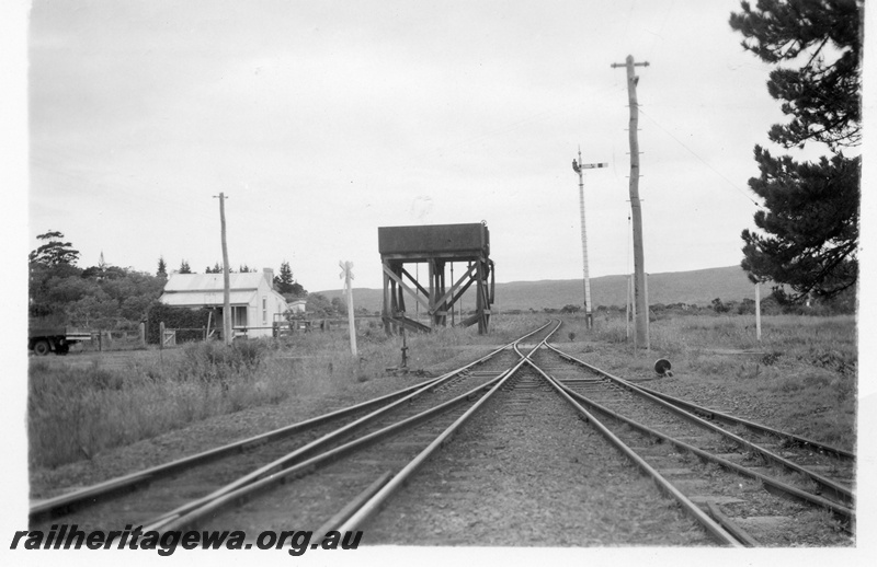 P04335
7 of 8, Water tower, water column, 13,000 gal. cast iron water tank, SM's house, level crossing, signal, points, points lever, cheese knob, Elleker, GSR line.
