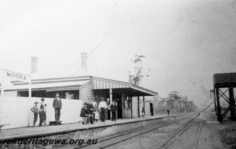 P04338
Station buildings, platform, nameboard, water tower, Moora, MR line.
