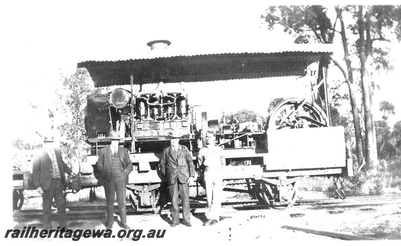 P04408
1 of 3 views of the experimental diesel loco built by Millars at the Yarloop workshops, side view with staff
