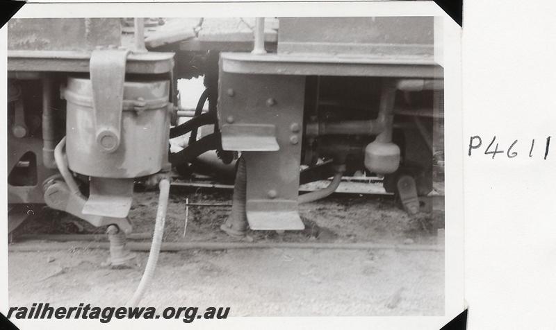 P04611
Millars loco No.72 at Yarloop, view of cab steps and Vacuum cylinder.
