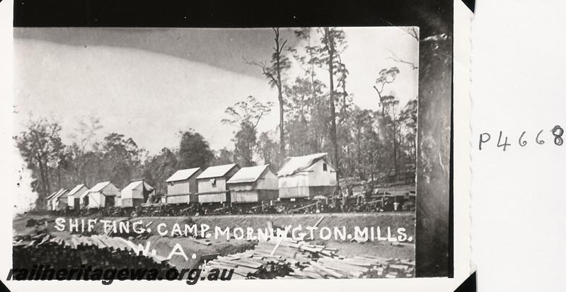 P04668
Shifting Camp, two man huts as used by workers on Millars mills, mounted on railway wagons, Mornington Mills
