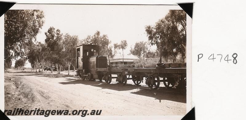 P04748
PWD Andrew Barclay 0-4-0 diesel loco PW31, jetty wagon No.30, Onslow, shunting 
