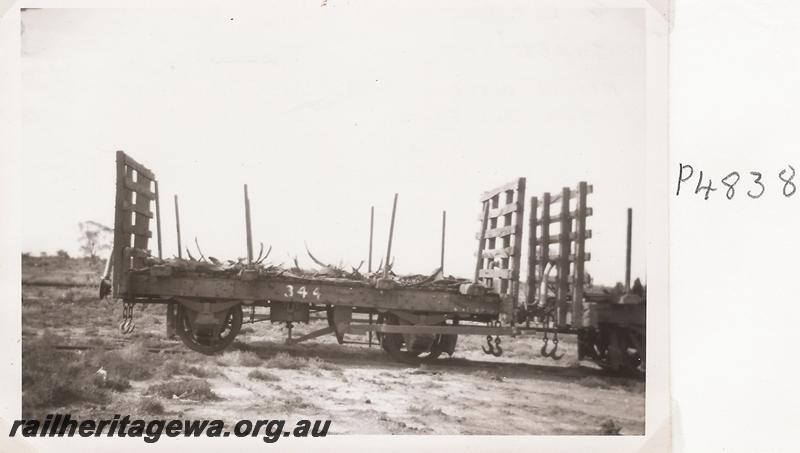 P04838
Lakewood Firewood Co. 4 wheel wagon with end open lattice type bulkheads, side view
