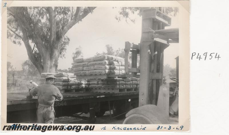 P04954
QCE class 23644 bogie flat wagon, Soundcem, being loaded with bags of cement for Kalgoorlie, a set of five photos
