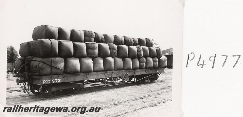 P04977
RAA class 5673, flat wagon, converted from RA class wagon, loaded with 61 wool bales, end and side view
