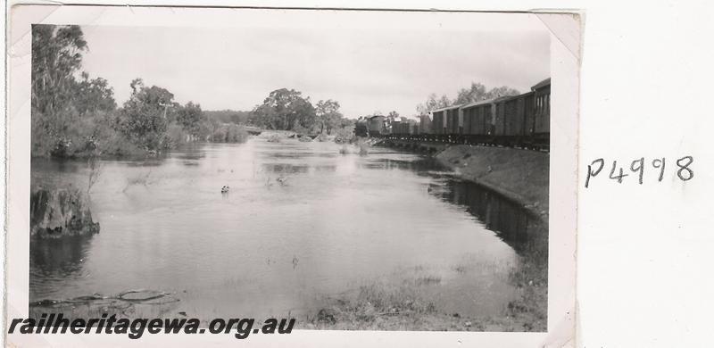 P04998
No.22 goods, passing the Blackwood River, near Kulikup, DK line, flooded
