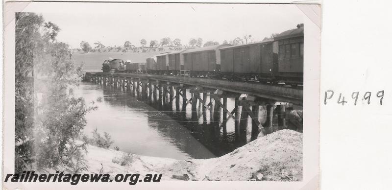 P04999
No.22 goods, on the Blackwood River Bridge, DK line, river in flood.
