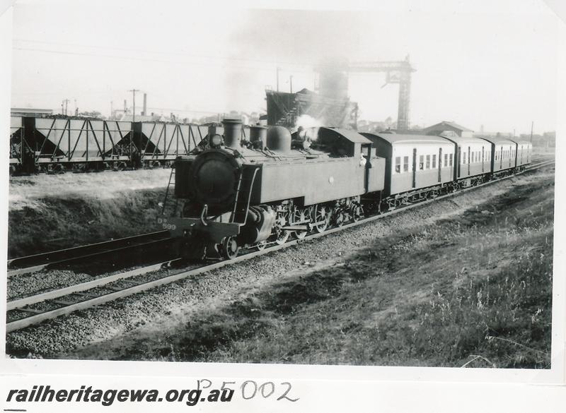 P05002
DD class 599. East Perth, suburban passenger passing East Perth loco depot
