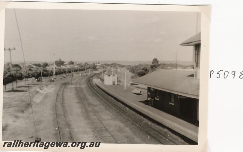 P05098
Station yard, Bassendean, showing part of the elevated signal box, elevated view looking east.
