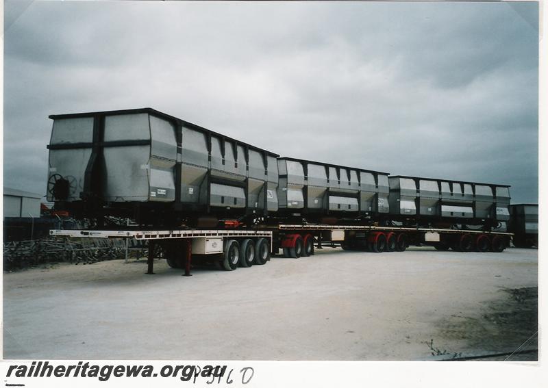 P05160
Iron ore wagons, Bassendean, loaded onto road trailers ready for transportation to the Pilbara
