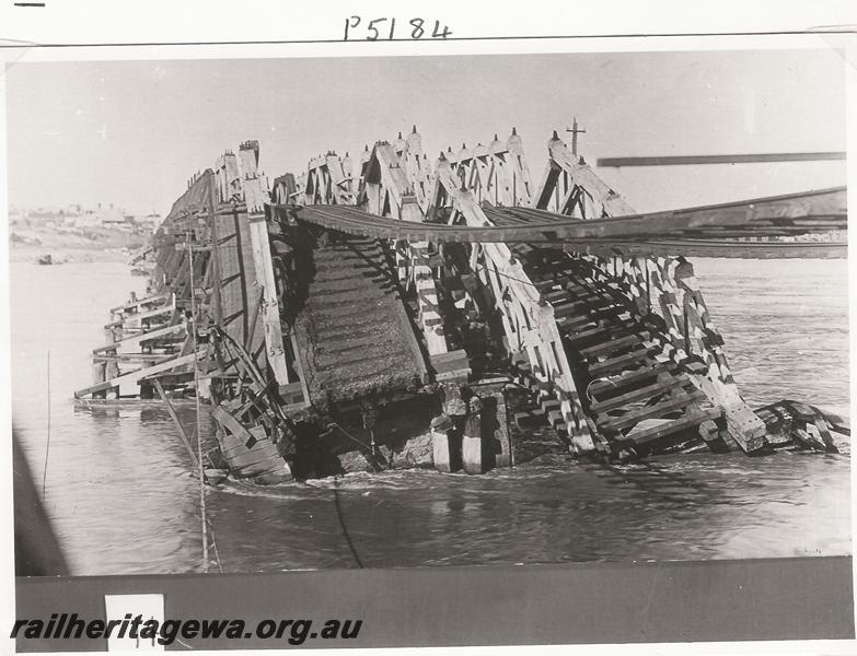 P05184
Collapse of the Fremantle railway bridge, view along bridge
