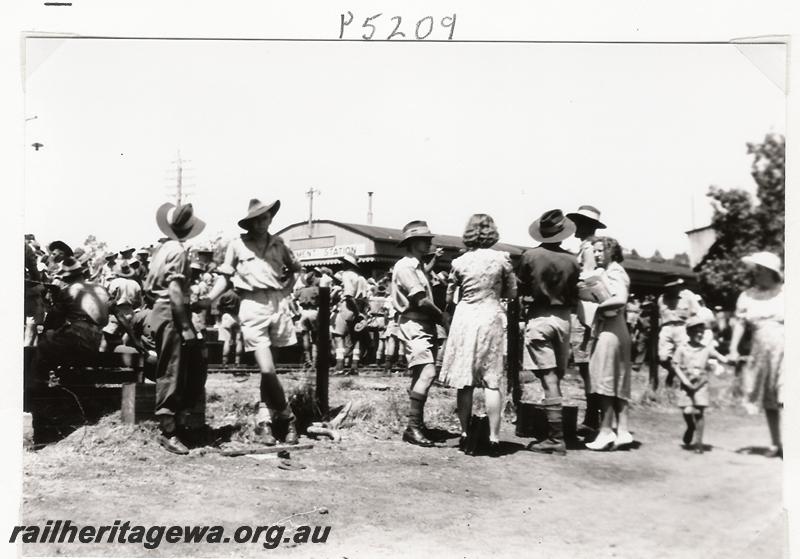 P05209
Troops at a station, end of the station canopy in the background, Chidlow, ER line
