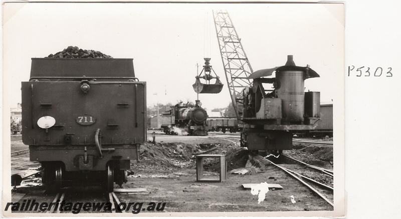 P05303
PM class 711 in black livery, steam crane, rear view of tender before the fitting of ladders
