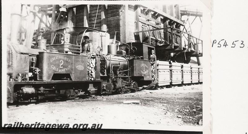 P05453
Kerr Stuart loco and Orenstein and Koppel loco at the Great Boulder Gold Mine hauling hoppers
