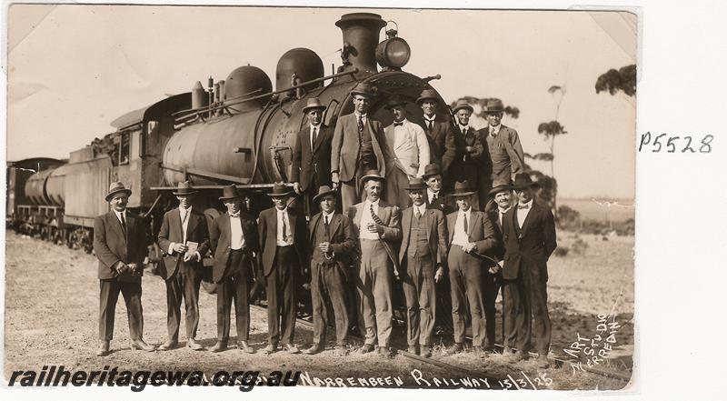 P05528
 L class, dignitaries posing in front of the loco, opening Merredin to Narembeen Railway, NKM line.
