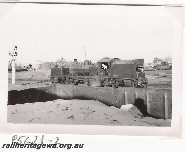 P05621
Visit by the Vic Div of the ARHS, MSA class 492 Garratt loco, East Perth loco depot, side and end view
