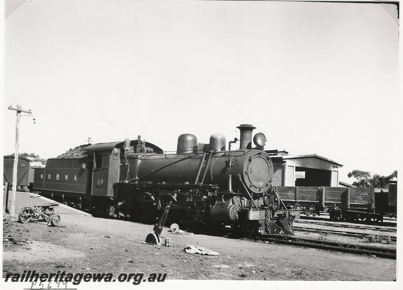 P05699
MRWA loco C class 15, Watheroo, MR line, goods train, L class wagon in background.
