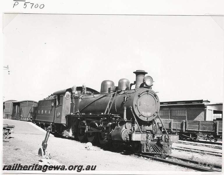 P05700
MRWA loco C class 15, Watheroo, MR line, goods train, L class wagon in background.
