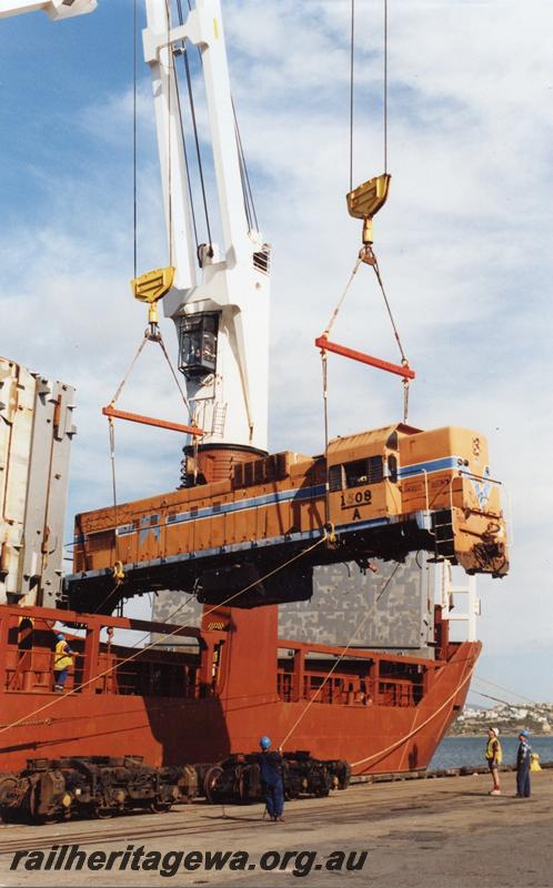 P05904
A class 1508, Fremantle wharf, being loaded onto ship for transport to New Zealand
