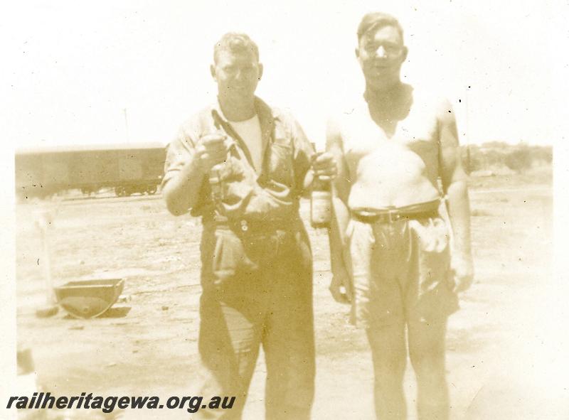 P05998
WAGR staff at Mullewa, barracks caretaker M. Callaghan & Acting driver, R. McKenna
